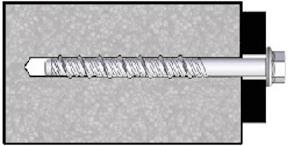 Skruv inskruvad i betongblock, sedd från sidan. Skruvens huvud är synligt till höger.