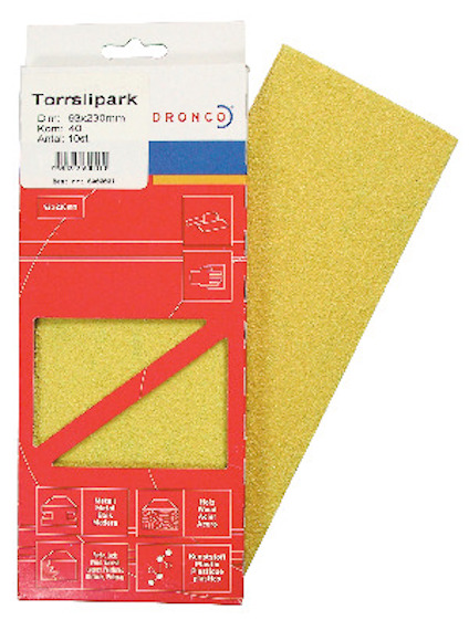 Förpackning med gult sandpapper, delen till höger syns tydligt. Textpåskrifter på förpackningen och färg i rött och vitt.