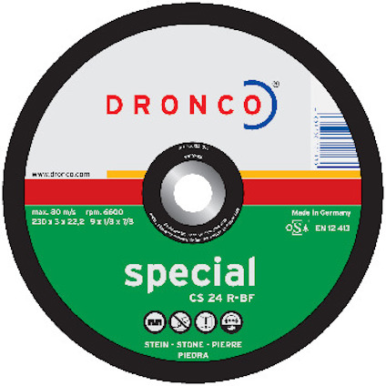 Rund svart kapskiva med texten "DRONCO special CS 24 R-BF" och symboler. Märkt "Made in Germany".