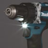 Batteridriven borrskruvdragare med LED-lampa, svart och blå design, siffermärkning på vridmomentinställningen.