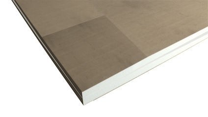 Gypsskiva med brun yta och vit kärna, visa snittet längs kanten.